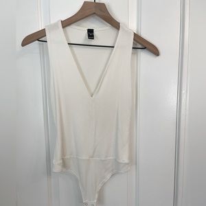Off White bodysuit with snaps